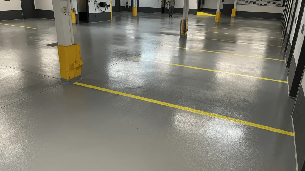 R&eacute;paration de dalle et marquage au sol pour stationnement int&eacute;rieur commercial.